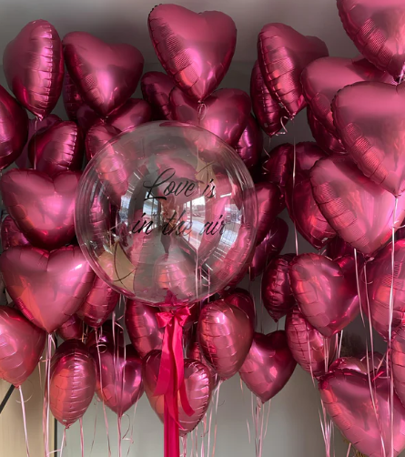 Hotel Room Decoration with Balloons for Couples' Romantic Getaways