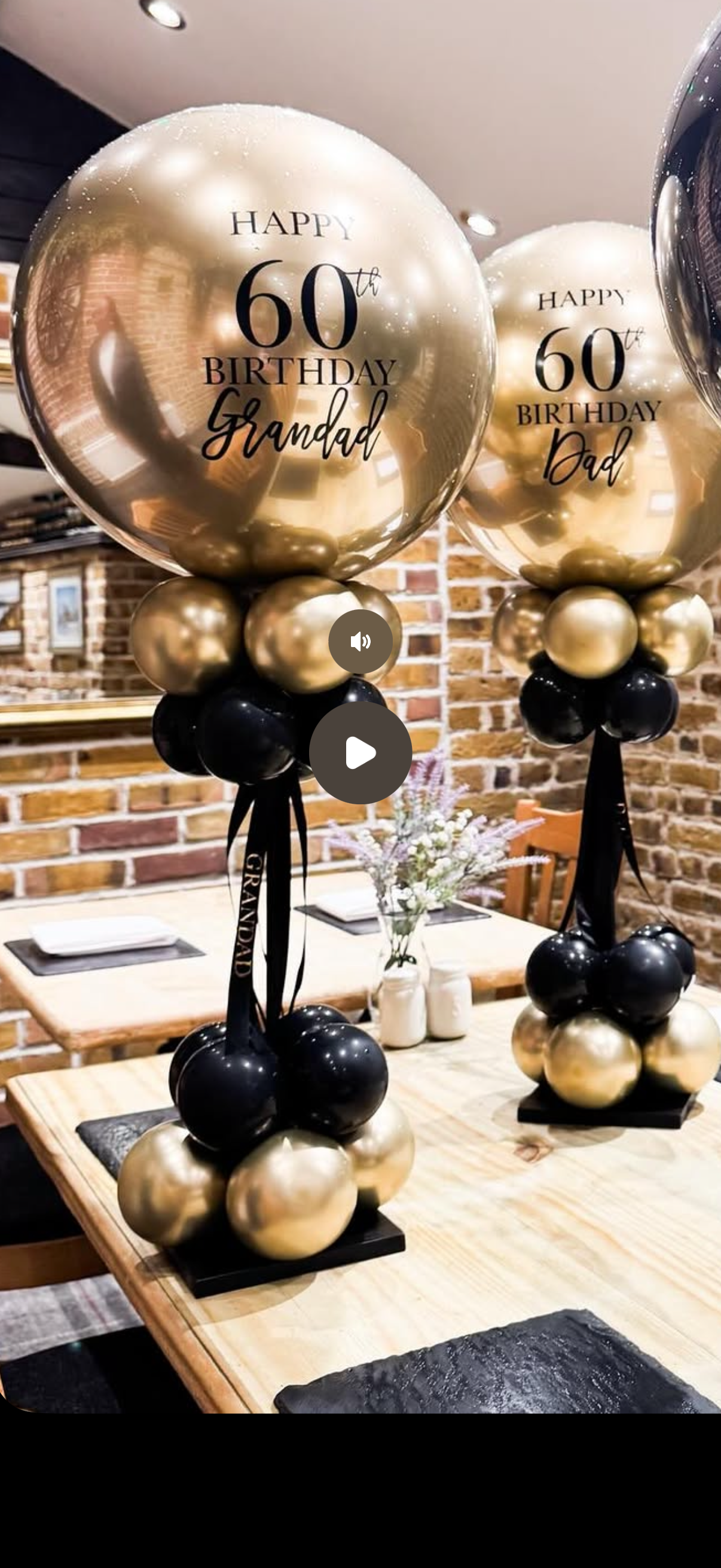 Black & gold centerpiece with custom print